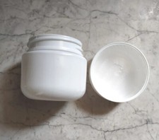 Lot of 20 plastic containers 2.5" x 2.5" with screw on lids white in color