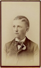 YOUNG MAN WITH BAD HAIRCUT, COOL BOW TIE AND FLOWERS IN LAPEL. CDV. WASH. PA.
