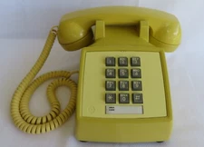 Western Electric Yellow 2500 touch tone desk telephone