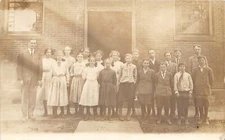 H82/ Interesting Teacher RPPC Postcard c1910 Early School Students 108