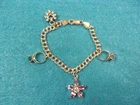 NEAT VTG STERLING SILVER CHARM BRACELET:  2x CZ SOLITAIRE RINGS; HEART; FLOWER