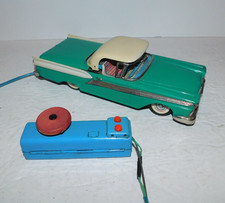 VINTAGE FORD FAIRLANE 500 REMOTE BATTERY OPERATED TIN TOY WITH RETRACTABLE TOP