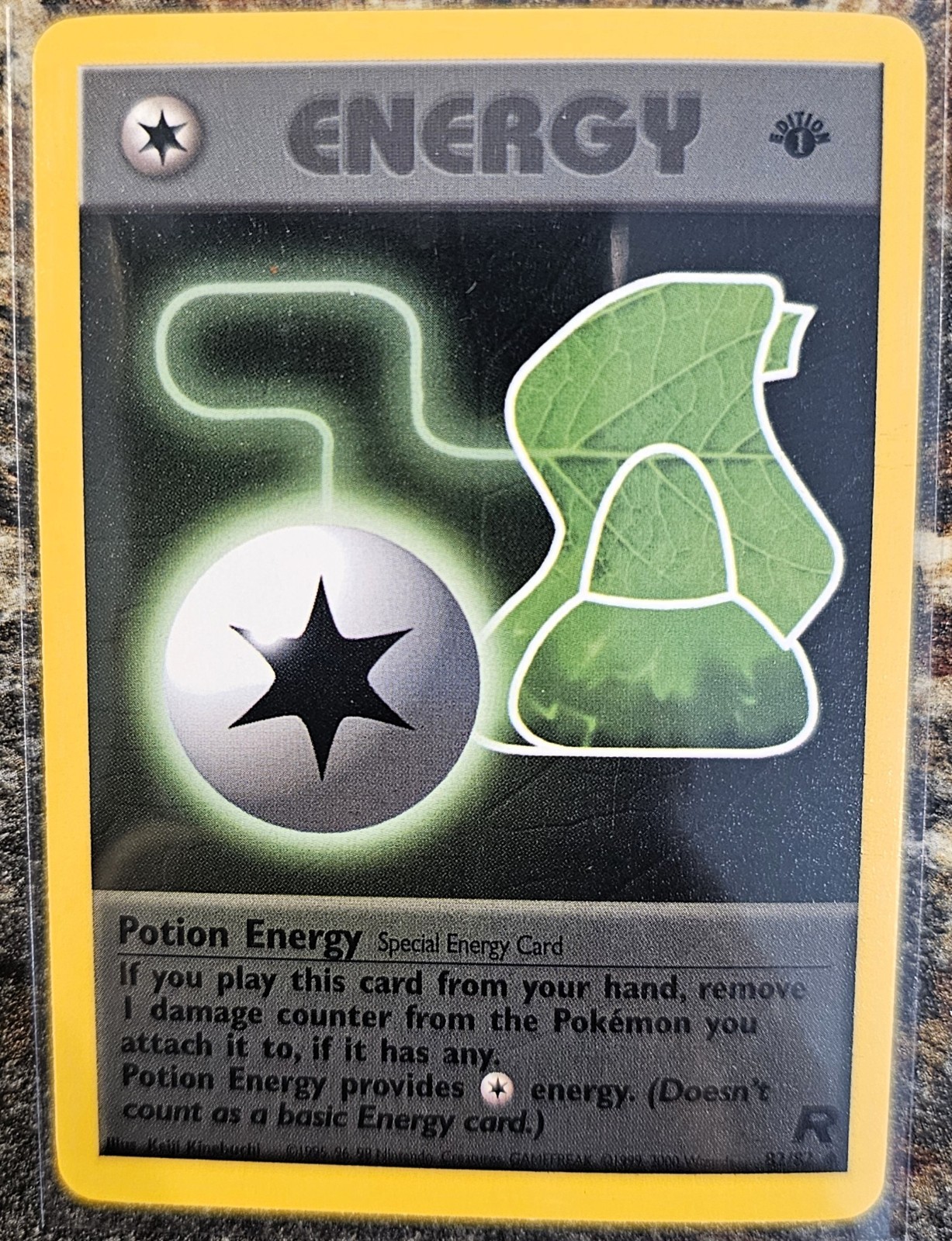 2000 Pokemon Team Rocket 1st Edition Potion Energy 82 NM or Better