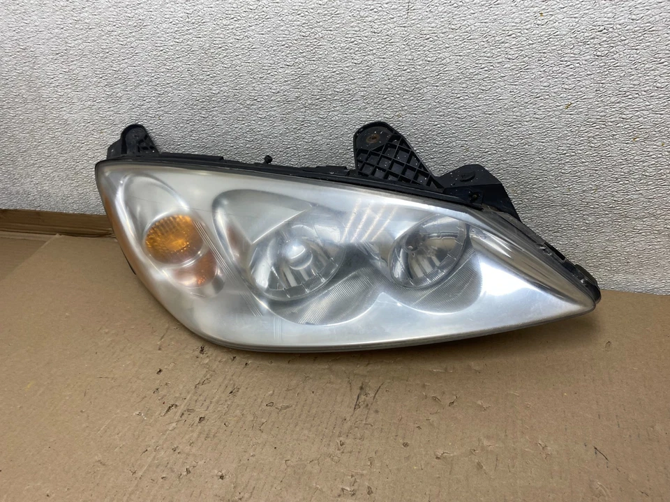 Faro halógeno lado derecho pasajero Pontiac G6 2005 a 2009 OEM U1074 DW Foto 2 de 4