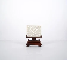 A Jade Carving 'Floral' Plaque with Wooden Stand