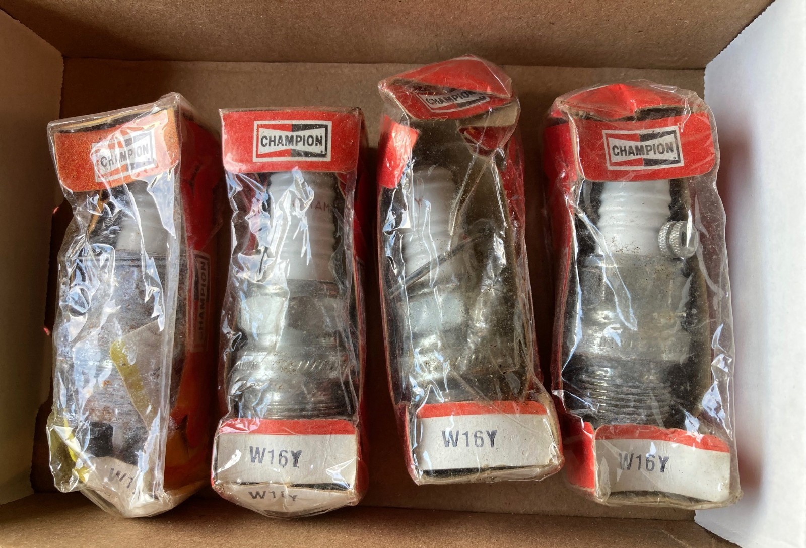 Three W16Y Spark Plugs Champion