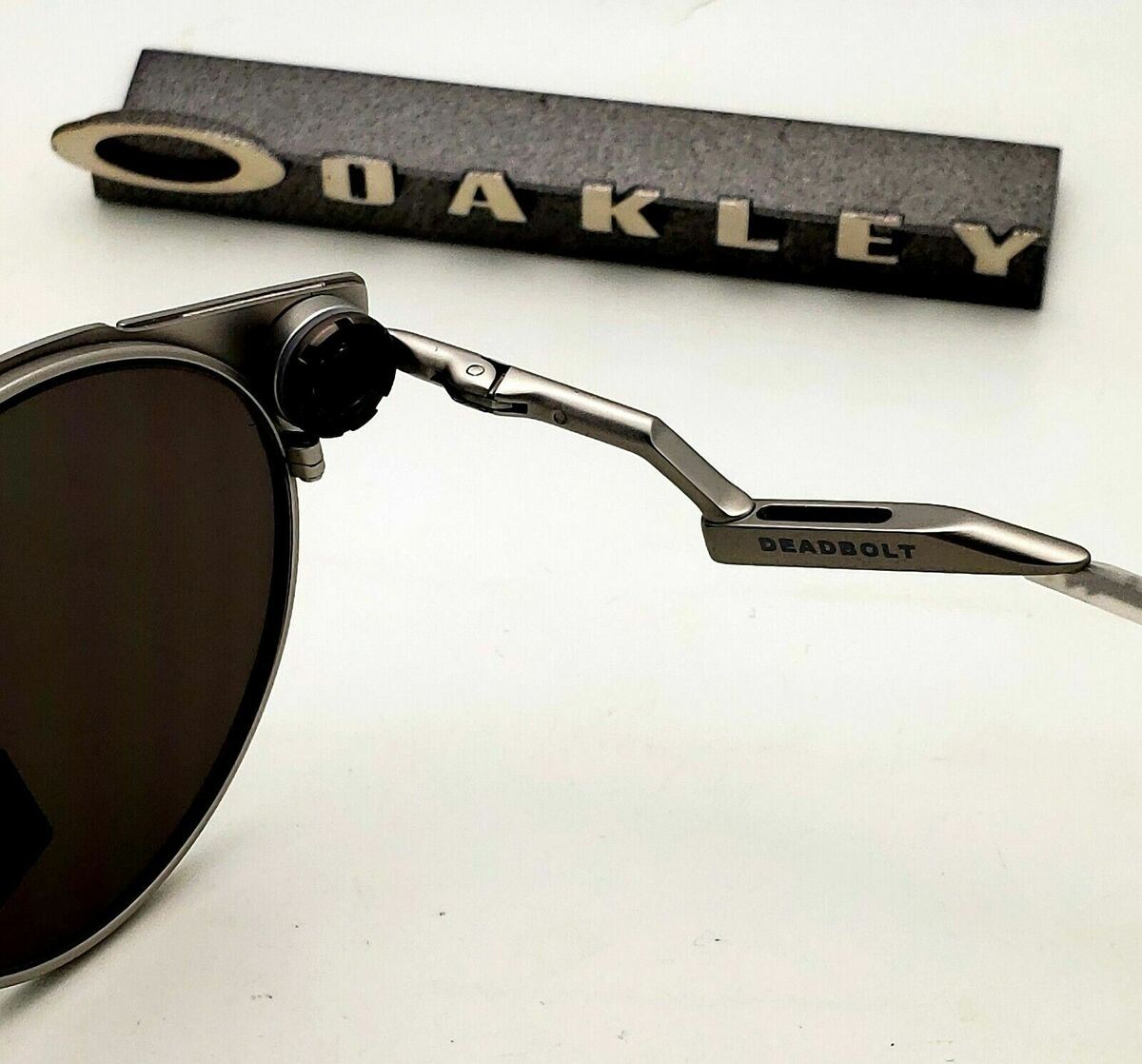 New Oakley Deadbolt Sunglasses OO6046-0150 Satin Chrome New Oakley Deadbolt Sunglasses OO6046-0150 Satin Chrome