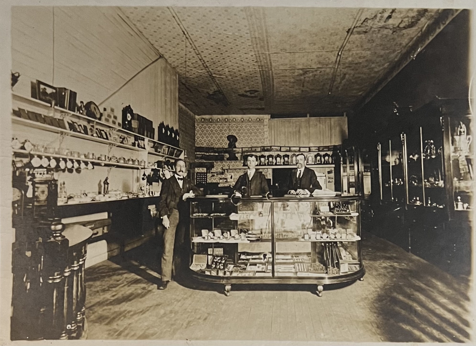 Cardboard photograph late 19th century interior watch and clock shop (7