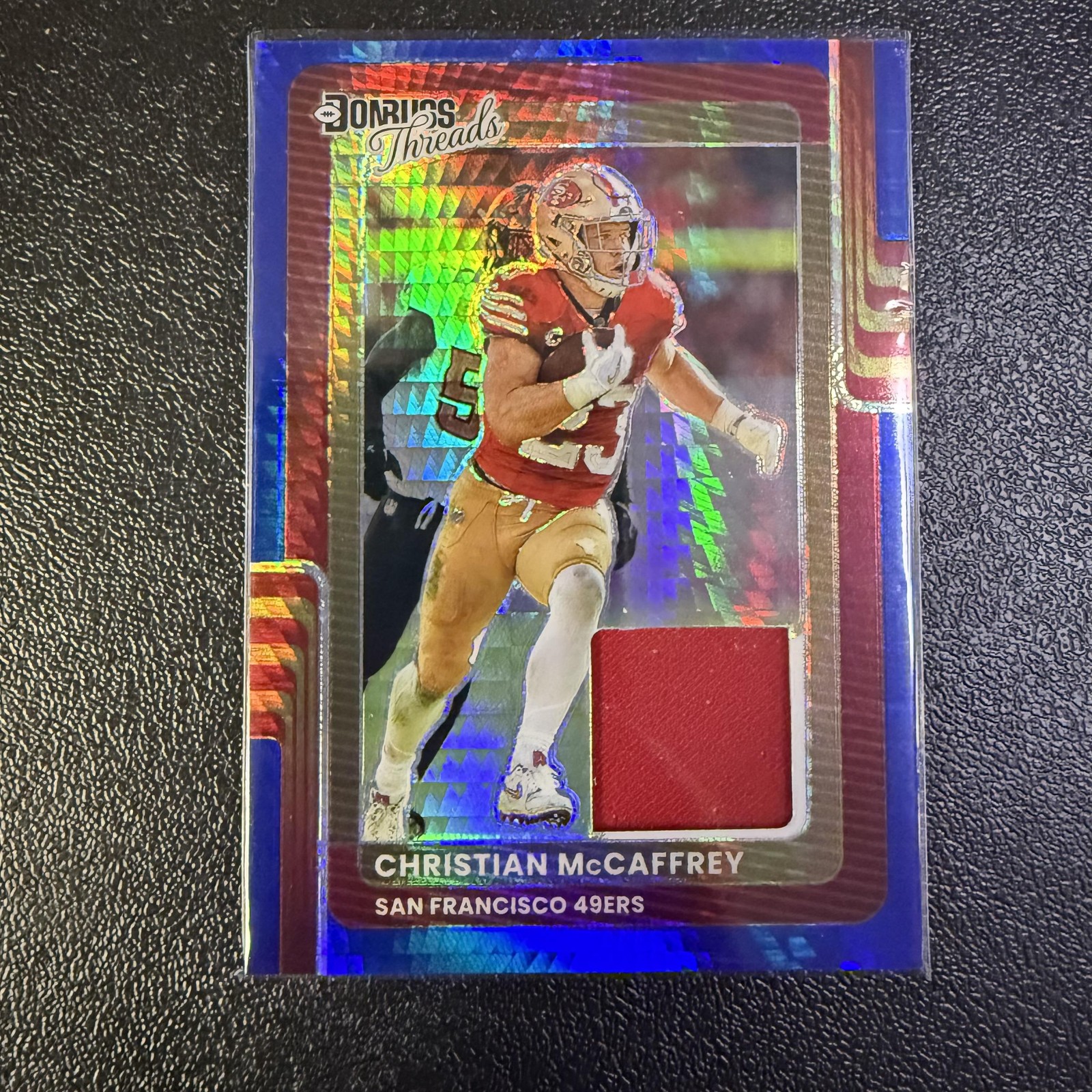 2025 Donruss Optic #DTBH-CMY Christian McCaffrey Donruss Threads Blue Hyper