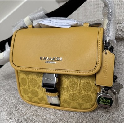 Men s COACH Racer Crossbody Bag Signature Canvas With Charms - Yellow CEB25