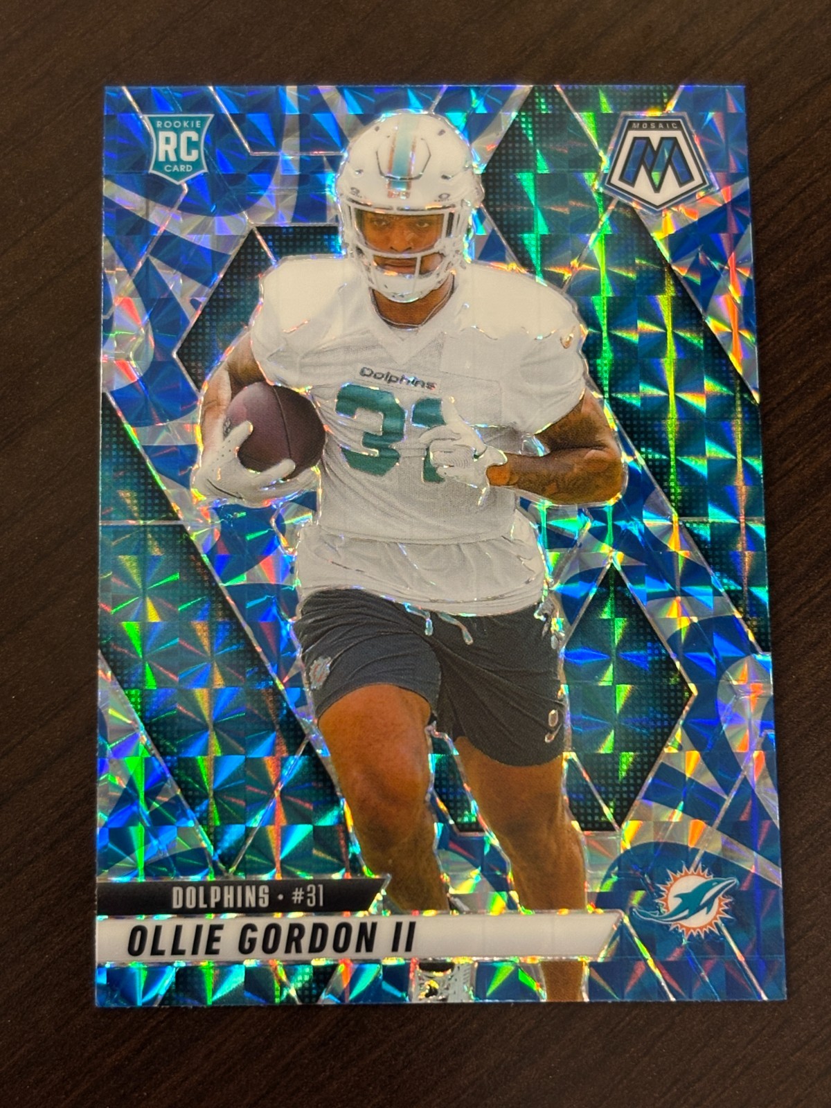 2025 Panini Mosaic #310 Ollie Gordon II Mosaic Reactive Blue - Dolphins