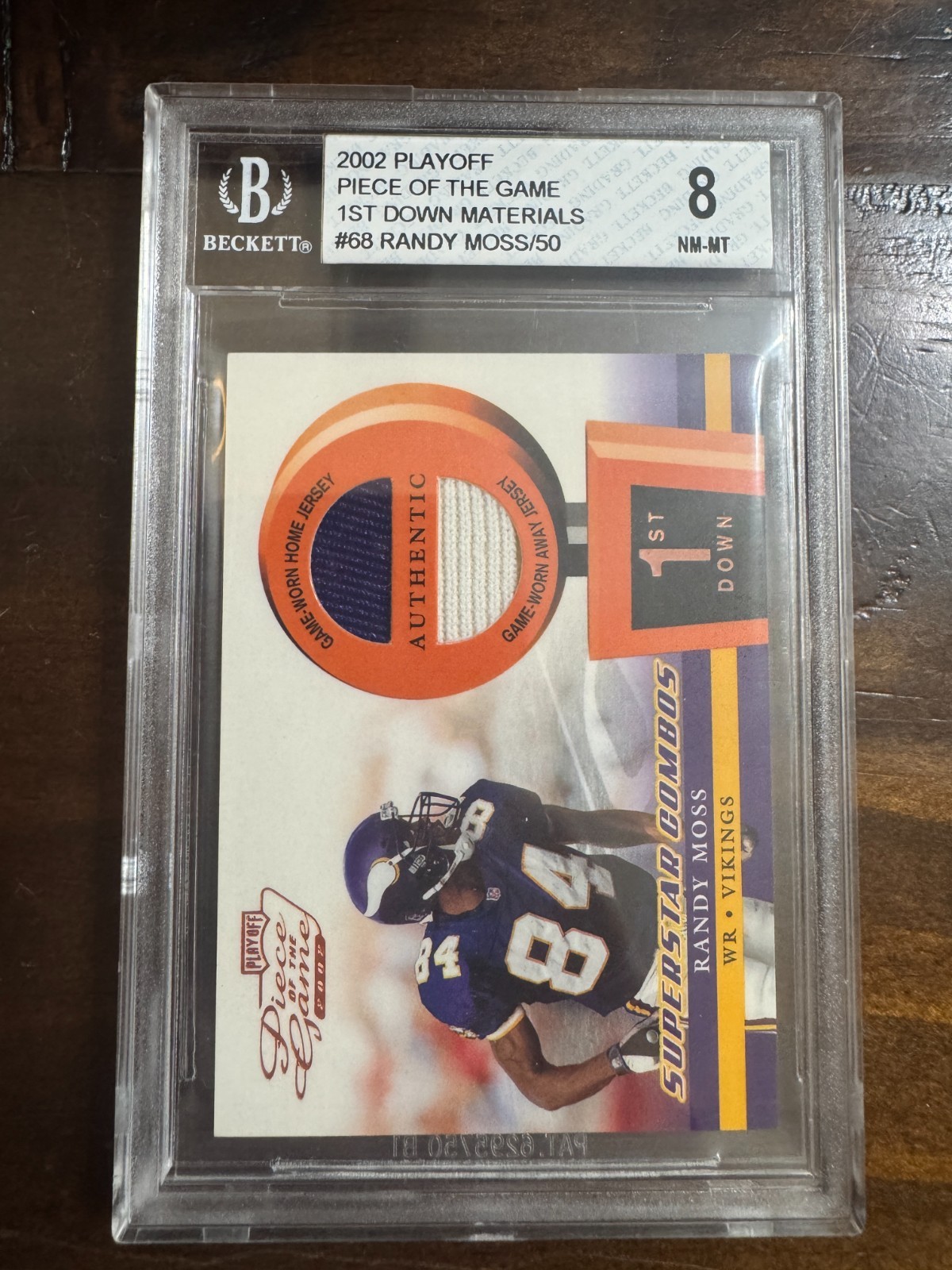 2002 Playoff Piece of the Game - Materials Randy Moss #POG-68 1st Down /50 BGS 8