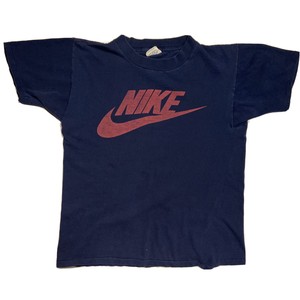 orange and navy blue nike shirt