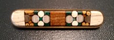 Collections Ancienne broche Art Déco faite en différents minéraux