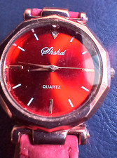 Red faced Shohd quartz watch