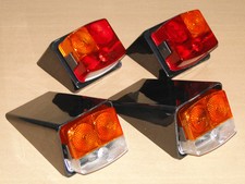 4-er Satz Hella Rückleuchte / Blinker mit Halterungen für Deutz 06 07 Traktor