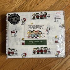 NWT PEANUTS Christmas 4 Piece KING SHEETS SET Snoopy Woodstock Singing Carols