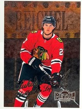 Lukas Reichel 1998-99 Retro 2022-23 SkyBox Metal Universe #R-48 Blackhawks