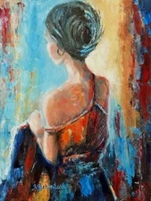 Bathed in color: a young girl is surrounded in expectation for the breaking day.