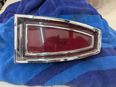 1965 mercury monterey tail light and 2 wind wing crank handles