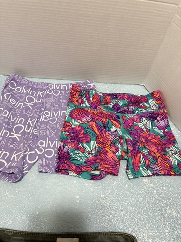 Shorts girls size 8, 3 Pairs Of Shorts Klein camouflage and Old Navy active,