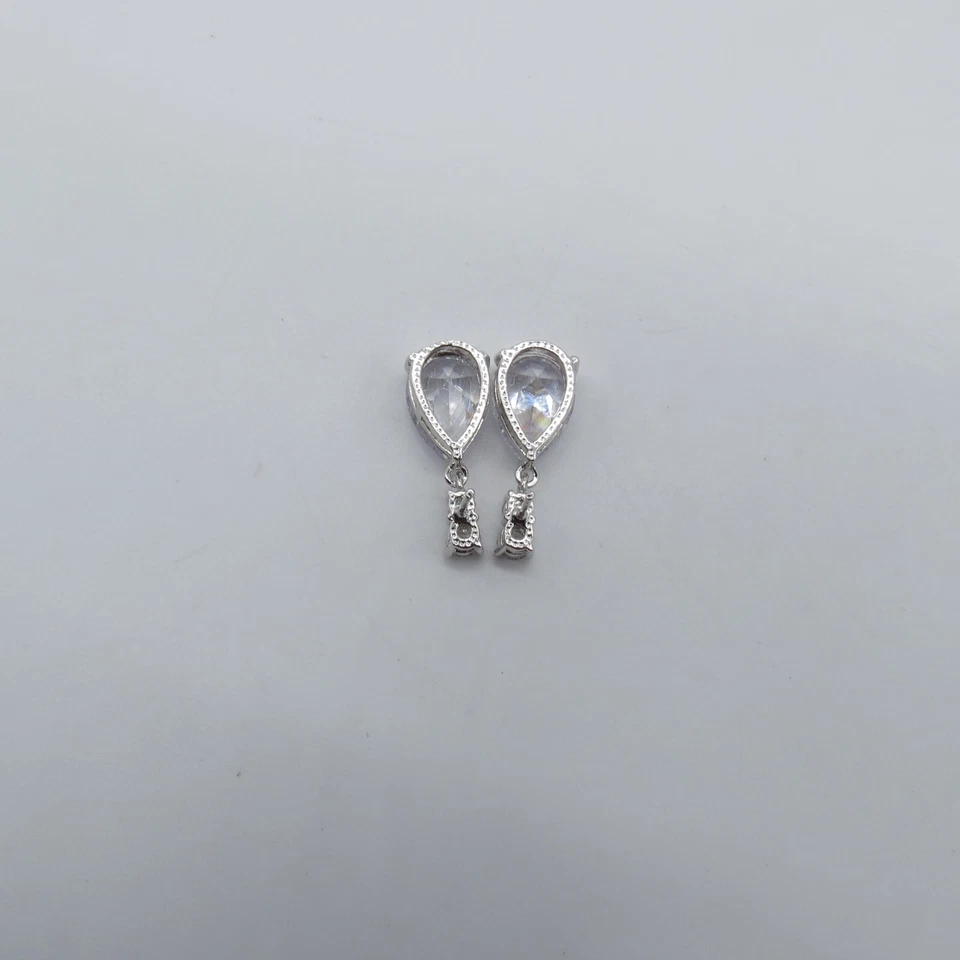 Pendientes colgantes lágrima circonita cúbica tono lavanda hermoso color suave Foto 3 de 4