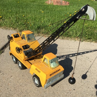 toy crane truck with wrecking ball