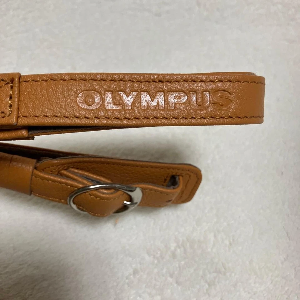 Chaqueta corporal y correa para el hombro de cuero genuino Olympus marrón claro usada Foto 3 de 4