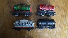 2 HORNBY (REGENT & CASTROL) & 2 MAINLINE (ESSO & BLACK UN-BRANDED) TANK WAGONS