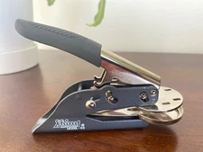 Shiny EM Embosser. Used. Device only. No customization