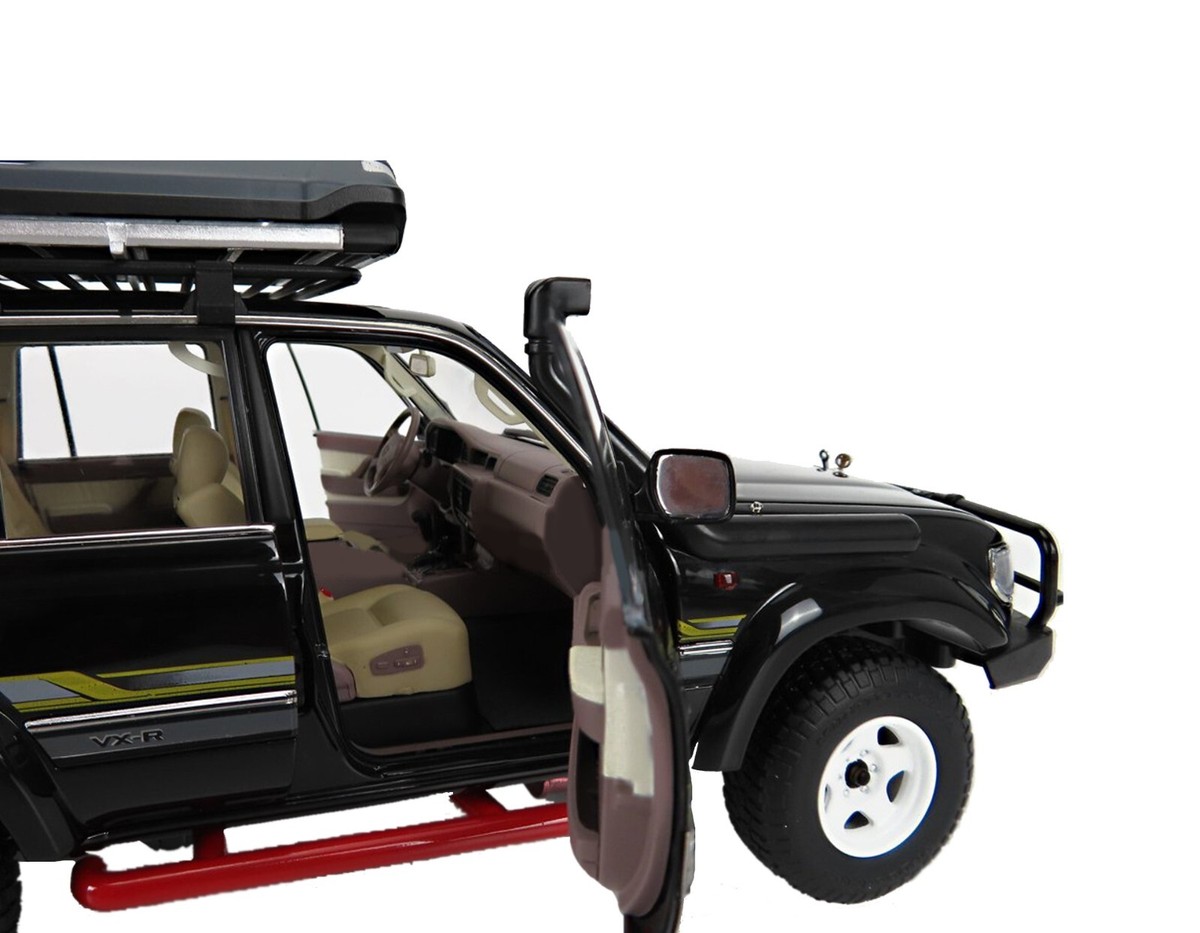 1990 TOYOTA LAND CRUISER J8 WITH ROOF PACK 1:18 SCALE BY NZG