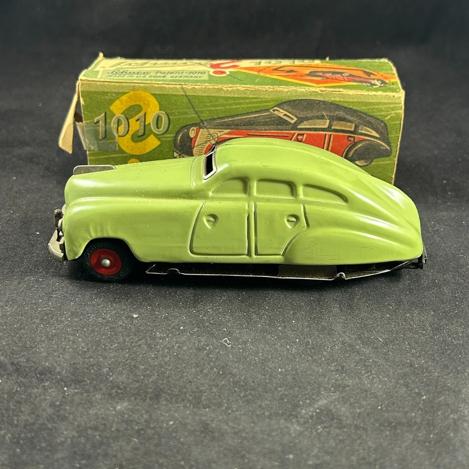 SCHUCO 1010 PATENTE 1750 CUERDA DE COLECCIÓN ANTIGUO COMO NUEVO COCHE DE JUGUETE ZONA EE. UU. ALEMANIA CON CAJA Foto 2 de 4