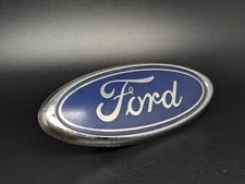 FORD 95GBF425A52CB 1021061 LOGO ACRONYM EMBLEM FRIEZE CREST WRITTEN BADGE LICENSE PLATE
