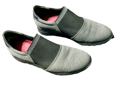 These are Munro KJ slip-on sneakers featuring a grey heathered fabric upper 8N