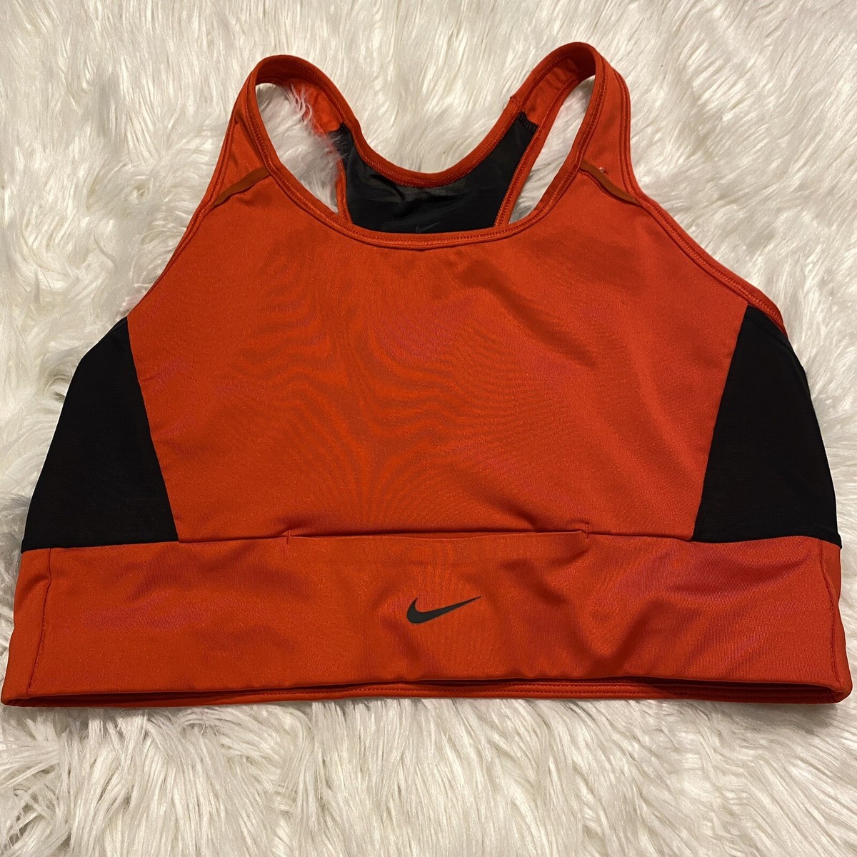 black and orange nike sports bra