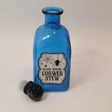 Halloween Blue Glass Bottle Black Skull Stopper "Cob Web Stew" Spider Webs 7"