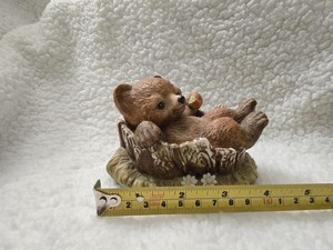 1986 Homco Masterpiece "Baby Bear Laying in Tree Stump" Figurine