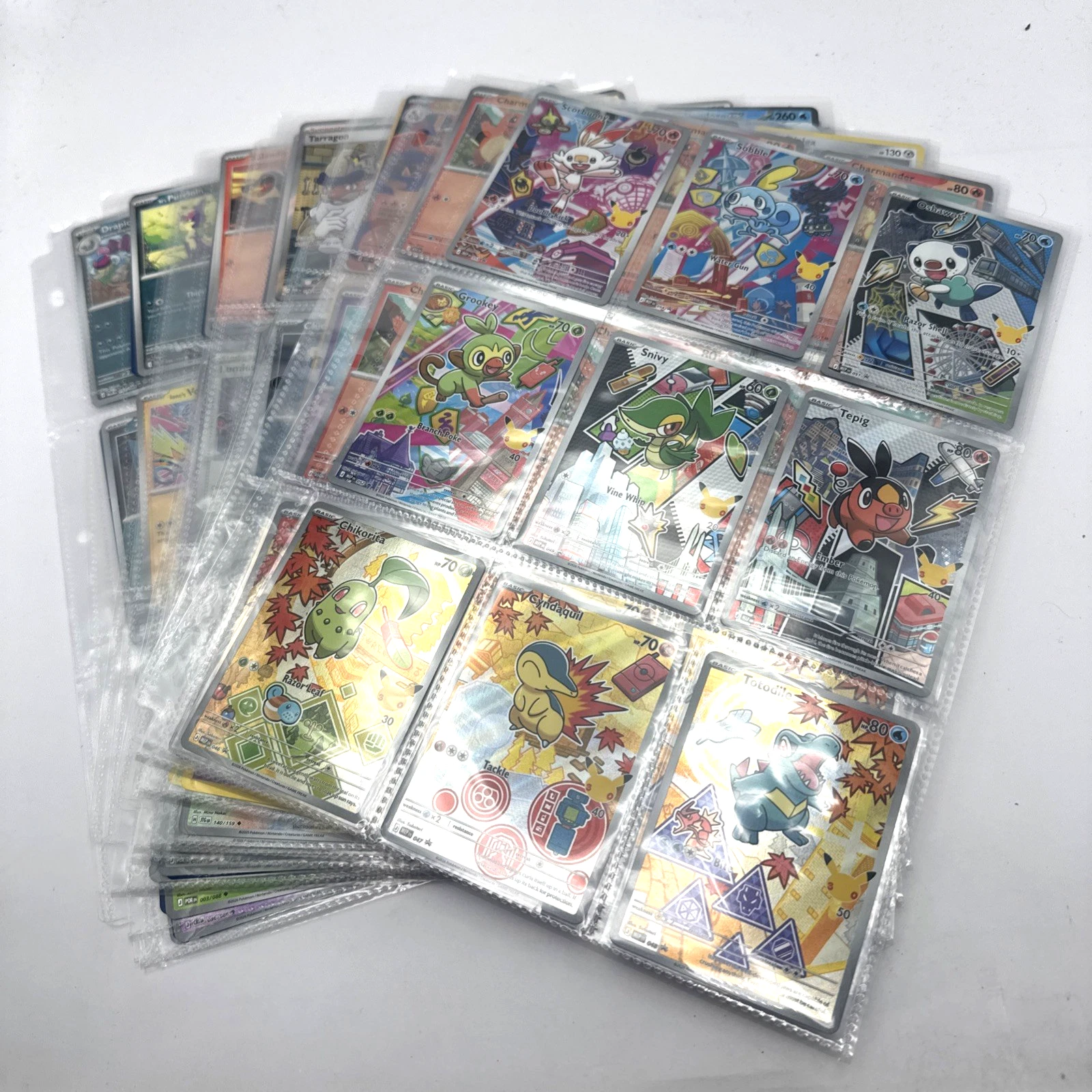 A fan of sleeved modern Pokemon cards