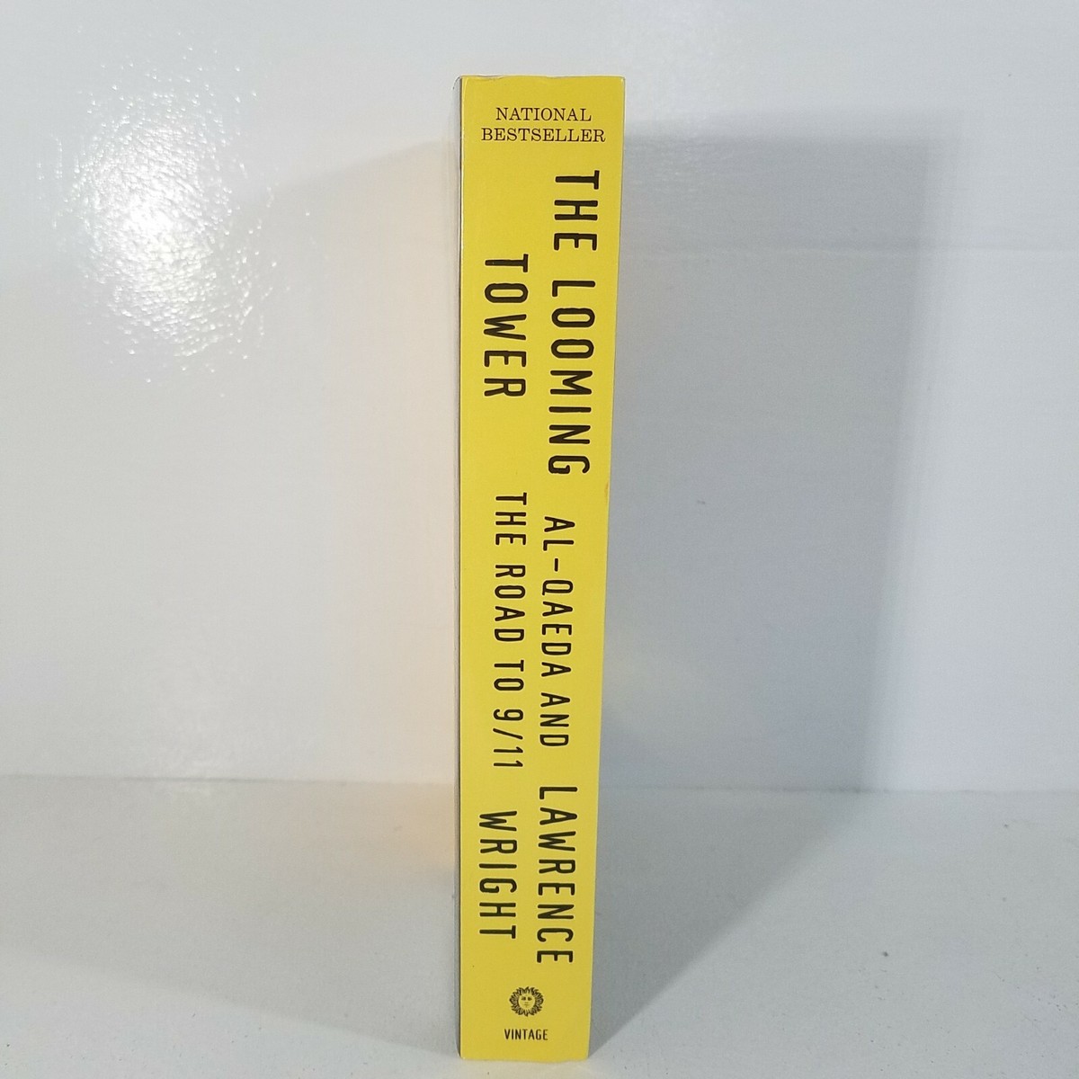 The Looming Tower: Al-Qaeda and the Road to 9/11 by: Lawrence Wright  Paperback