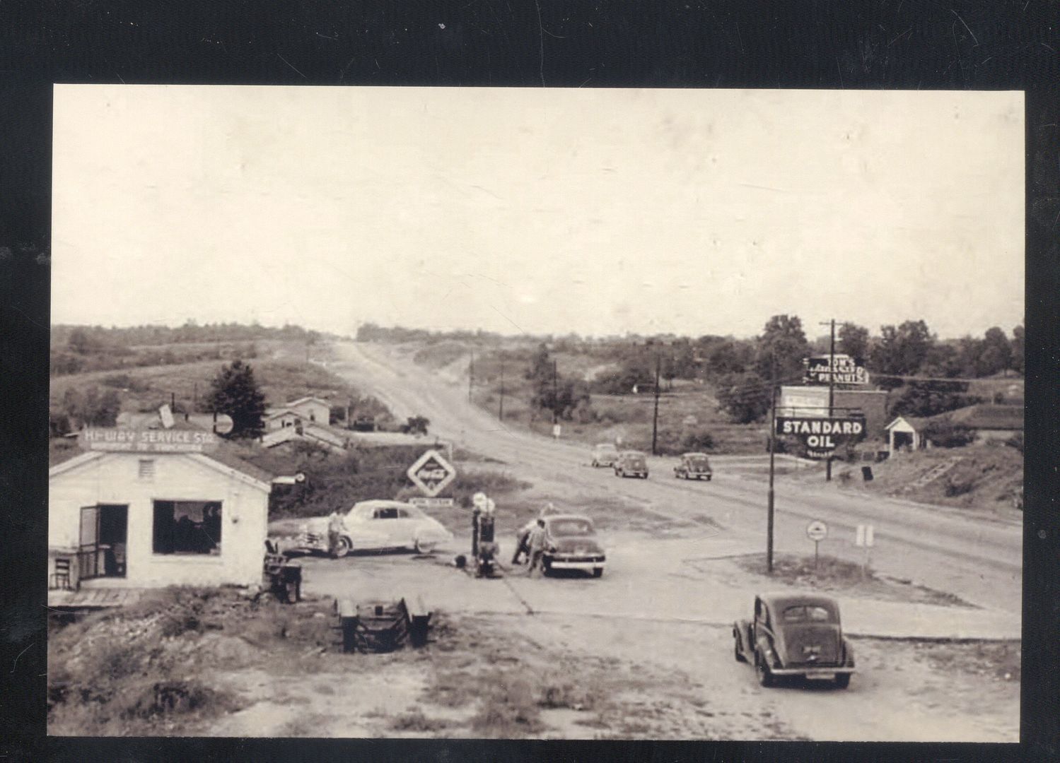 real-photo-tupelo-mississippi-highway-45-78-old-cars-store-postcard