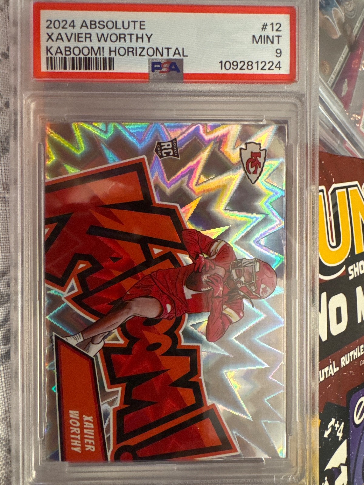 2024 Panini Absolute - Kaboom! Horizontal Xavier Worthy #12 (RC)