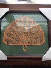 Custom framed hand made fan with dried flower accents.