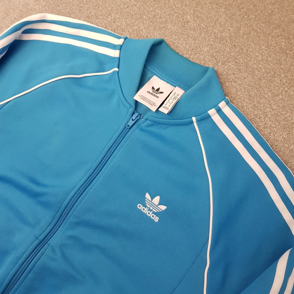 Chaqueta de Pista Adidas Para Hombre Mediana Azul Cielo Originales Superstar Trifolio Cremallera Gimnasio Foto 2 de 4