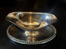 Ancien plat de service bateau à sauce plaqué argent