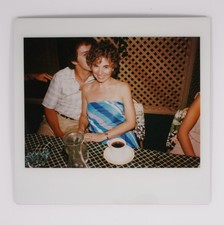 Vtg Polaroid Snapshot Photo Couple Dining Woman In Striped Dress 1980s