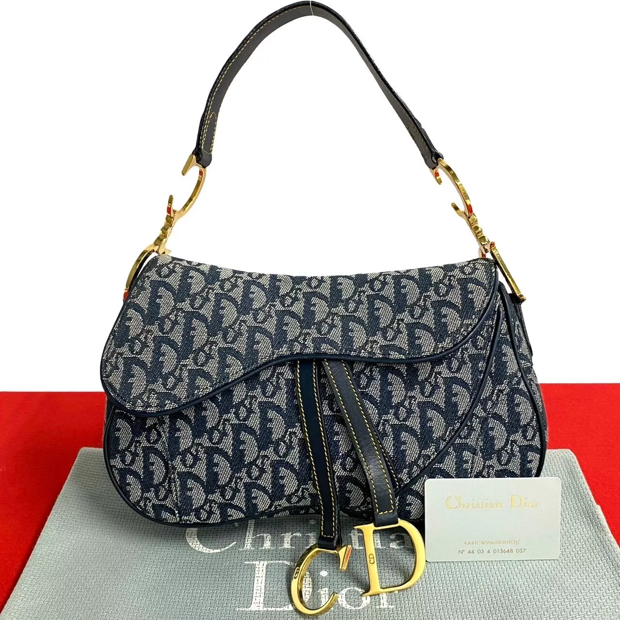 Sac bandoulière Christian Dior motif trotteur logo métal toile cuir marine 23600