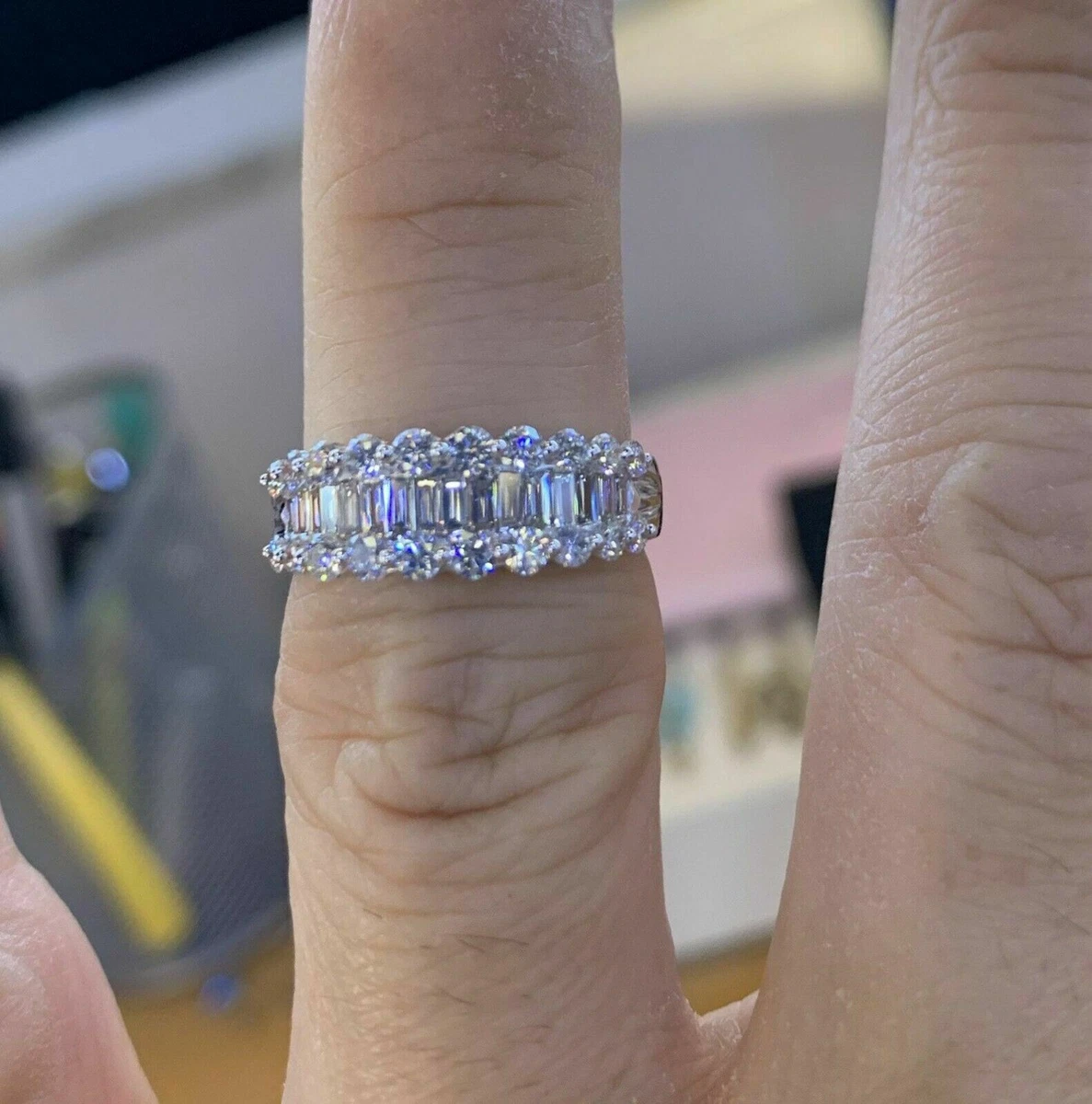 Emerald cut diamond band hotsell ring