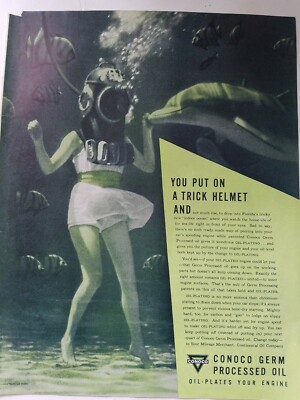 1931 Conoco germ processed oil woman scuba diver feeding dolphin vintage ad