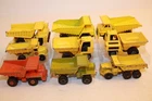 Nine (9) Vintage 1960's - 1970's Matchbox Lesney / Tomica / Zylmex Dump Trucks