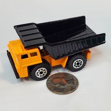 Matchbox 1989 Diecast Construction Dump Truck 1/140 Scale Orange